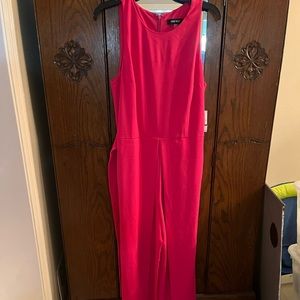 Pink punch Nine West jumpsuit with tags. Size 12.